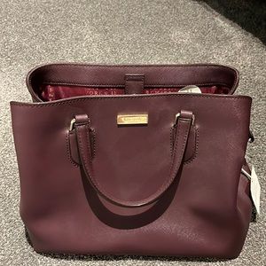 Kate spade eggplant purple bag. Never used, no tags.